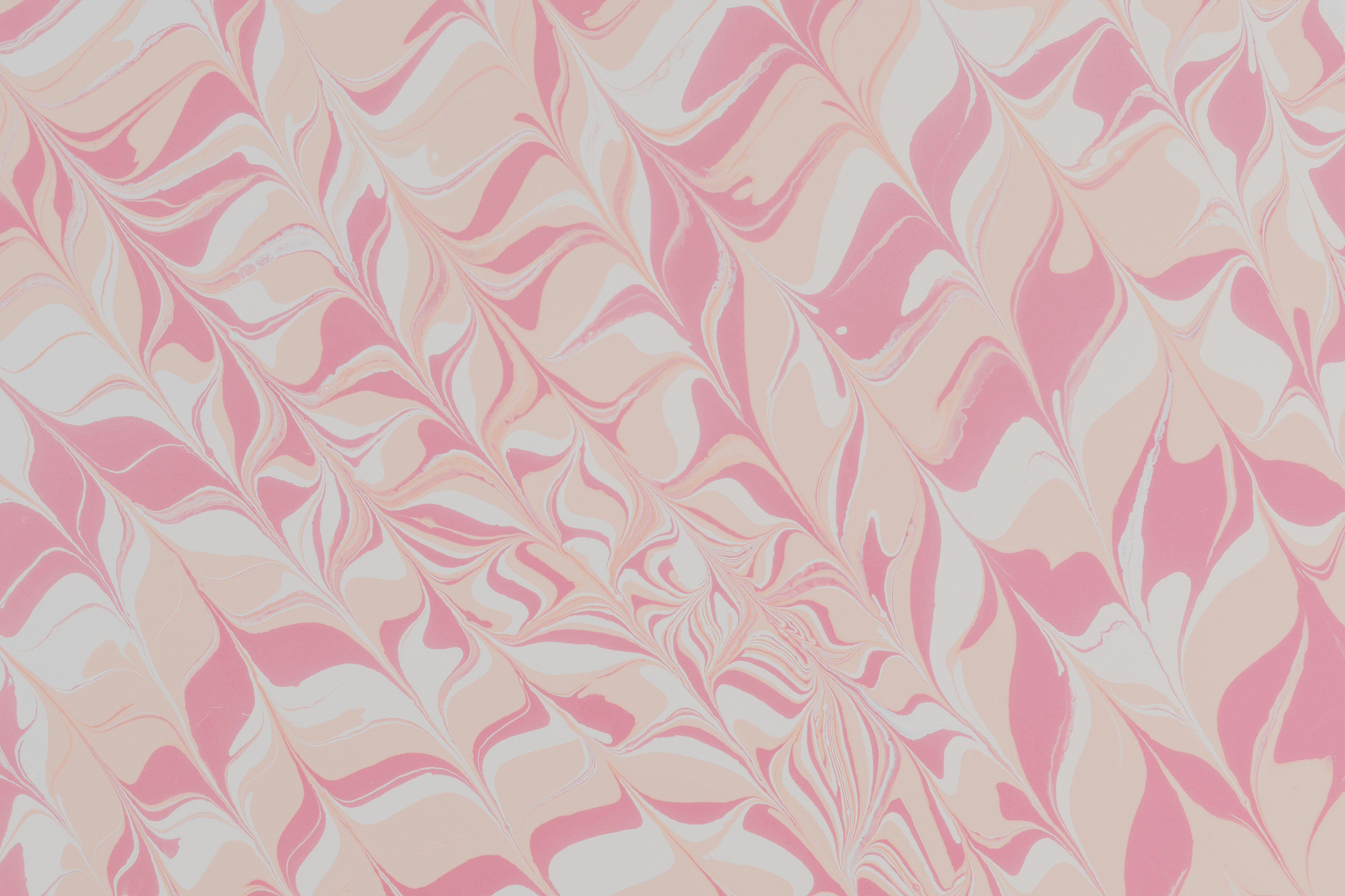 pink and white floral textile